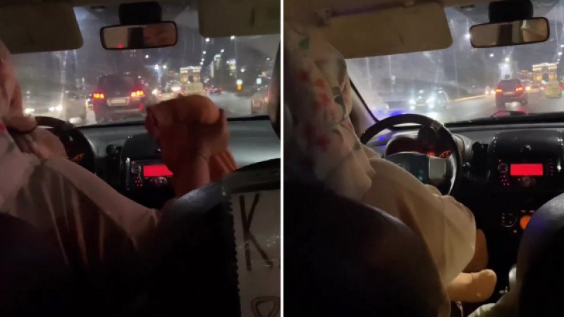 Шофьорка на такси кърми бебето си, докато управлява колата ВИДЕО