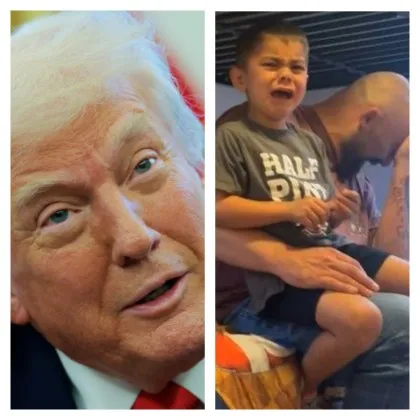 Анди седи в скута на баща си когато той попита