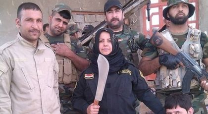 Кошмарът за терористите! Ето я жената, която сече и готви главите на джихадистите (СНИМКА)