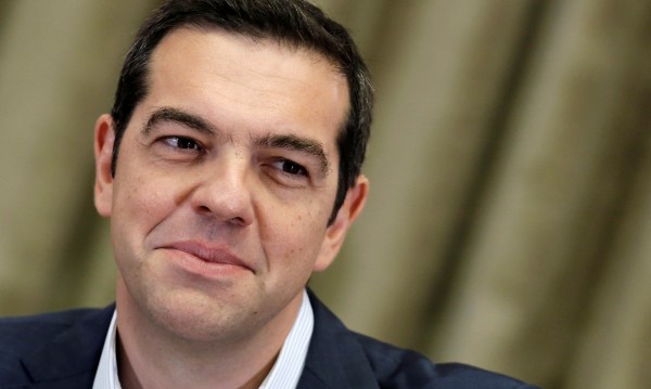 Афганистанче, чиито дом бил нападнат, на гости на Ципрас