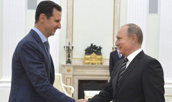 Ходът на Путин с фигурата на Асад в играта със
Запада